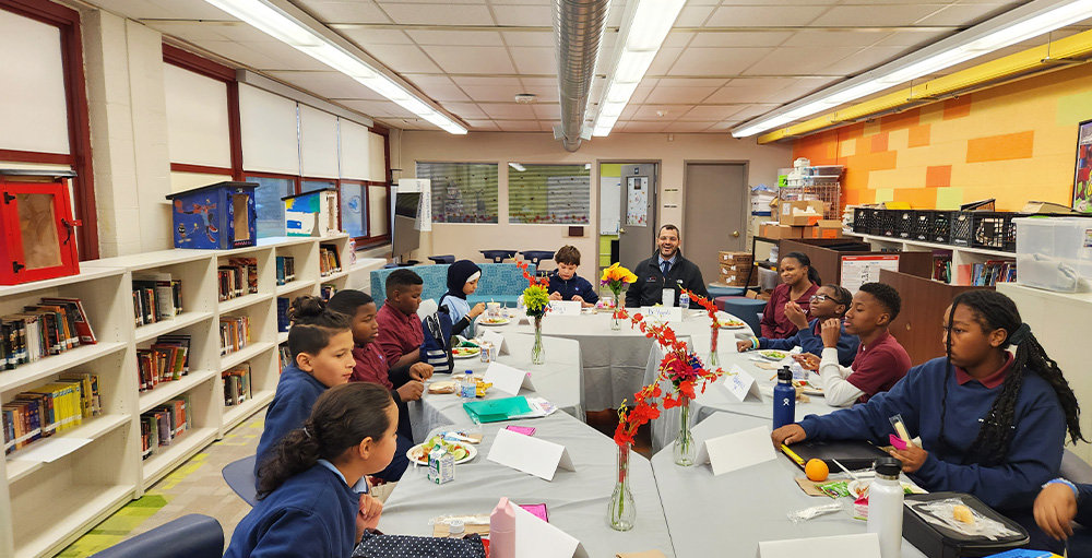 Syracuse Academy of Science Middle Schoolers Discuss Future Plans while Having Lunch with Dr. Hayali